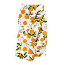 Clementine muslin swaddle blanket with citrus and greenery print