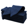 Navy Blue cotton napkins with single hemstitch folded on dinner plate
