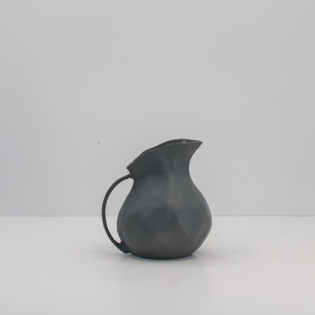 Durable lightweight aluminum vase in warm grey finish