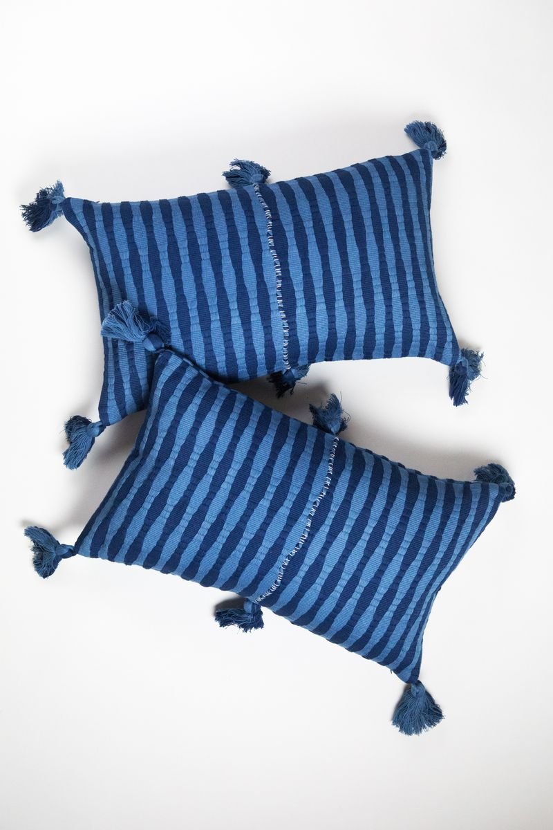 Pair of Antigua pillows in natural indigo stripe