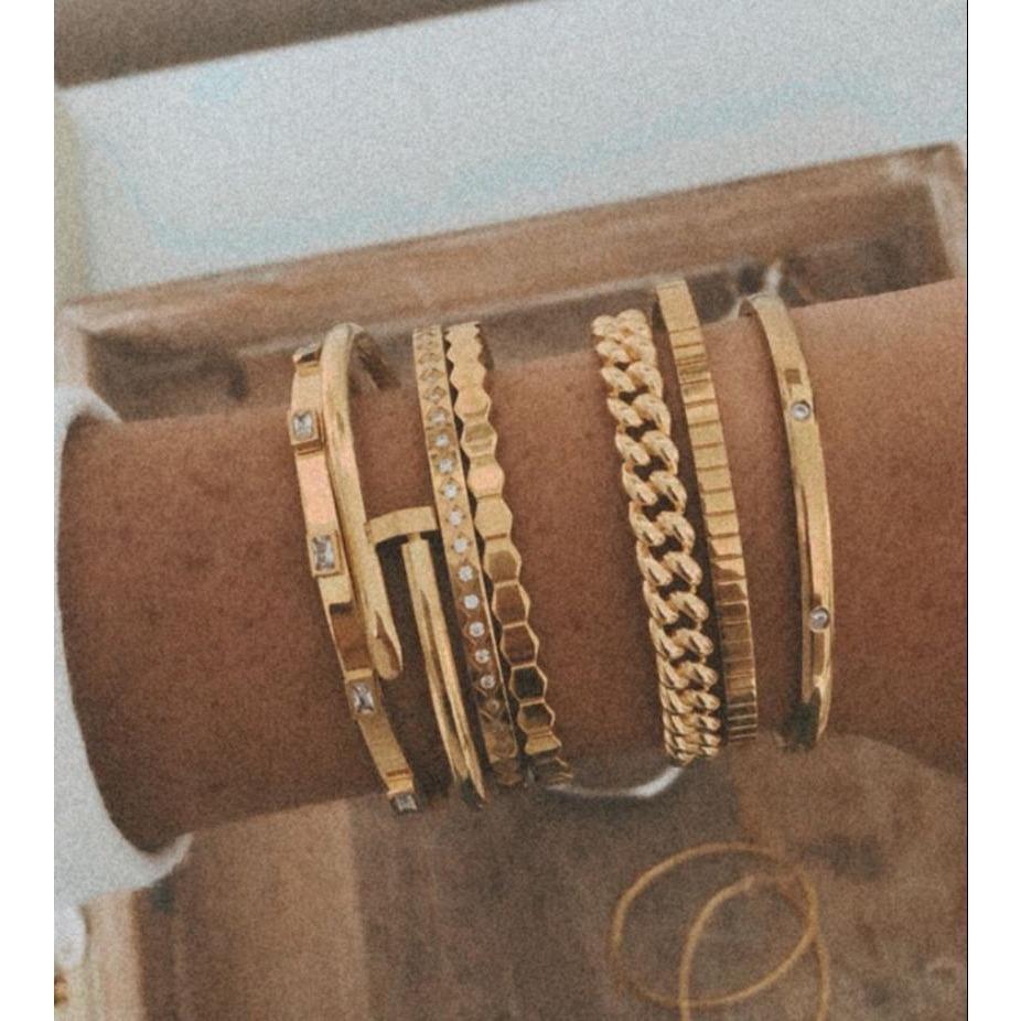 Edgy nail-inspired bangle bracelet