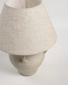 Decorative vase-inspired table lamp with soft lighting