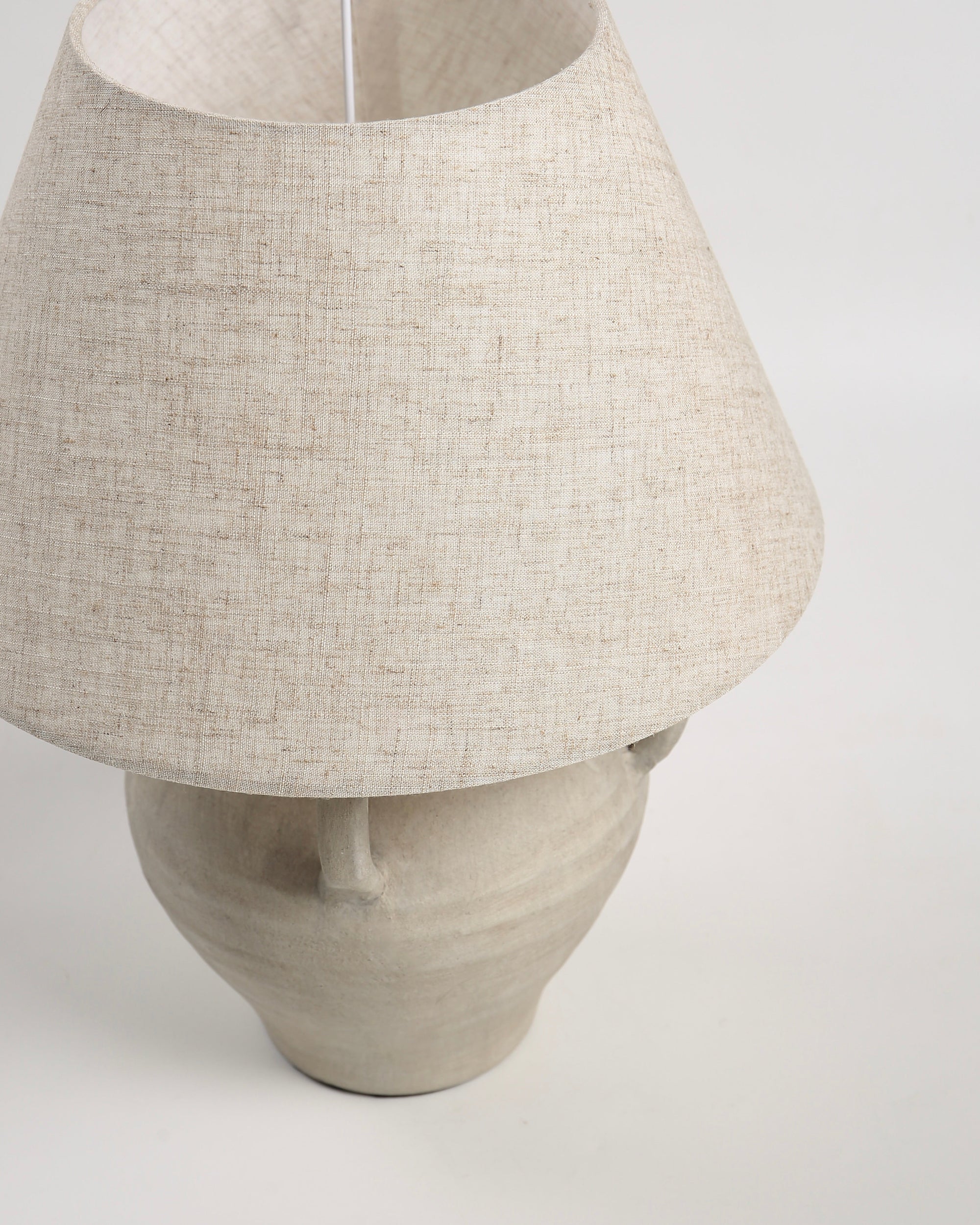 Decorative vase-inspired table lamp with soft lighting