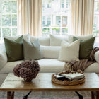 Vivienne sage floral pillow styled in a modern living room