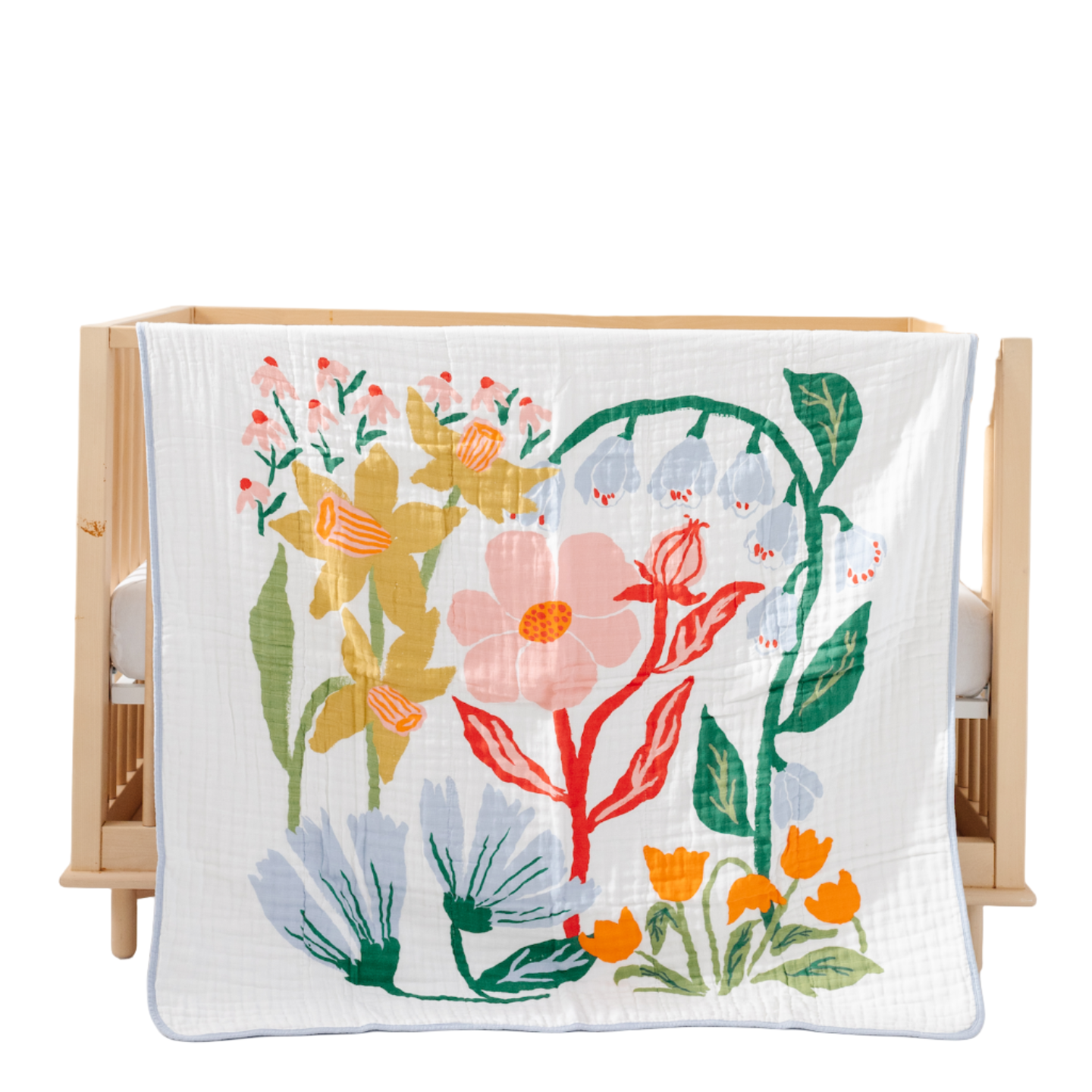 Cottage Garden floral quilt styled in nursery