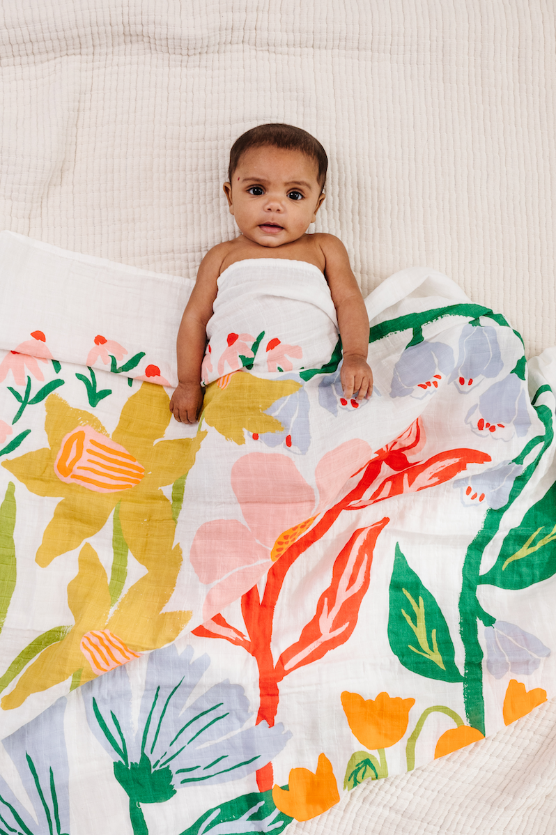 Clementine Kids Cottage Garden swaddle styled in nursery