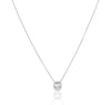 Silver CZ bezel necklace styled for layering