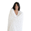 Double Ruched Faux Fur Throw Blanket styled on sofa
