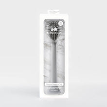 Odor-resistant silicone cleaning brush for cookware