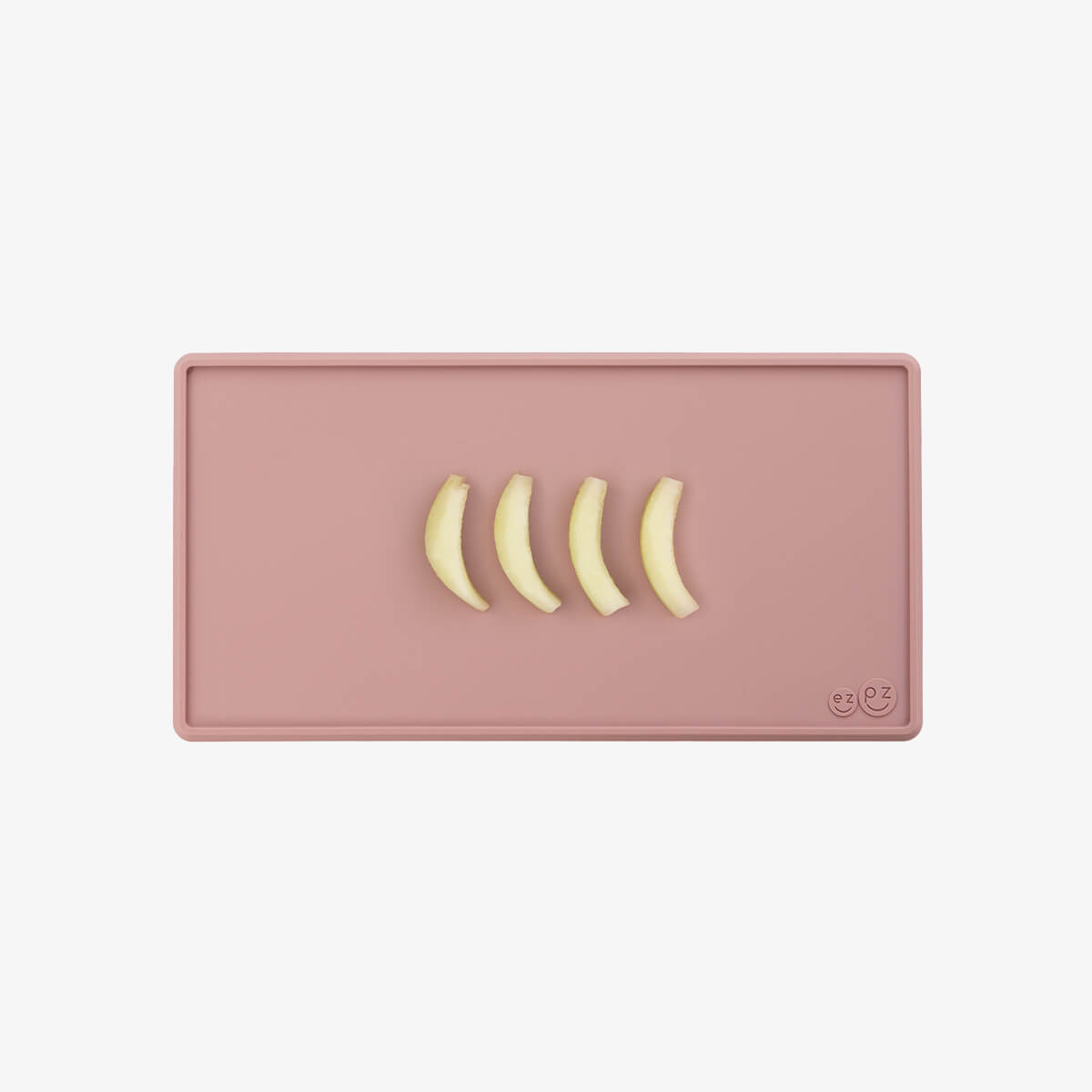 Non-slip baby placemat with travel band rolled up