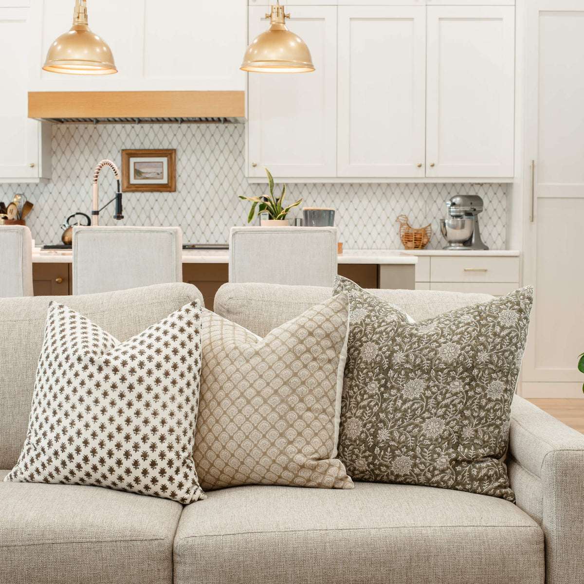 Leila olive green pillow cover in an all-season green pillow arrangement