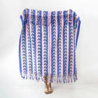 Palm ikat blanket in blue and pink, detail