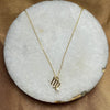 Sterling silver zodiac necklace styled on model
