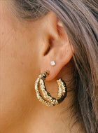 Dainty cubic zirconia studs styled on model