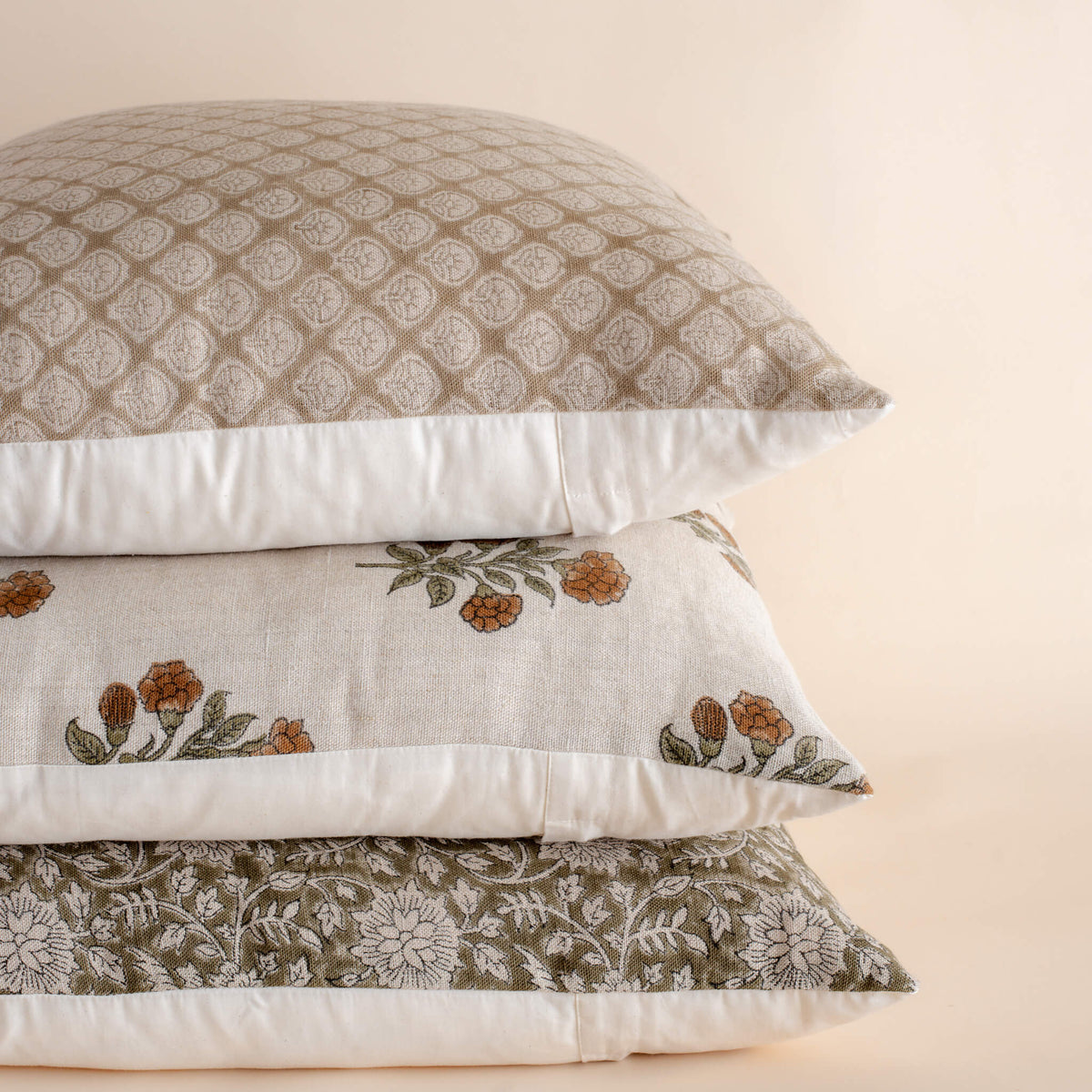 Neutral pillow combination with the Leila olive green block print pillow