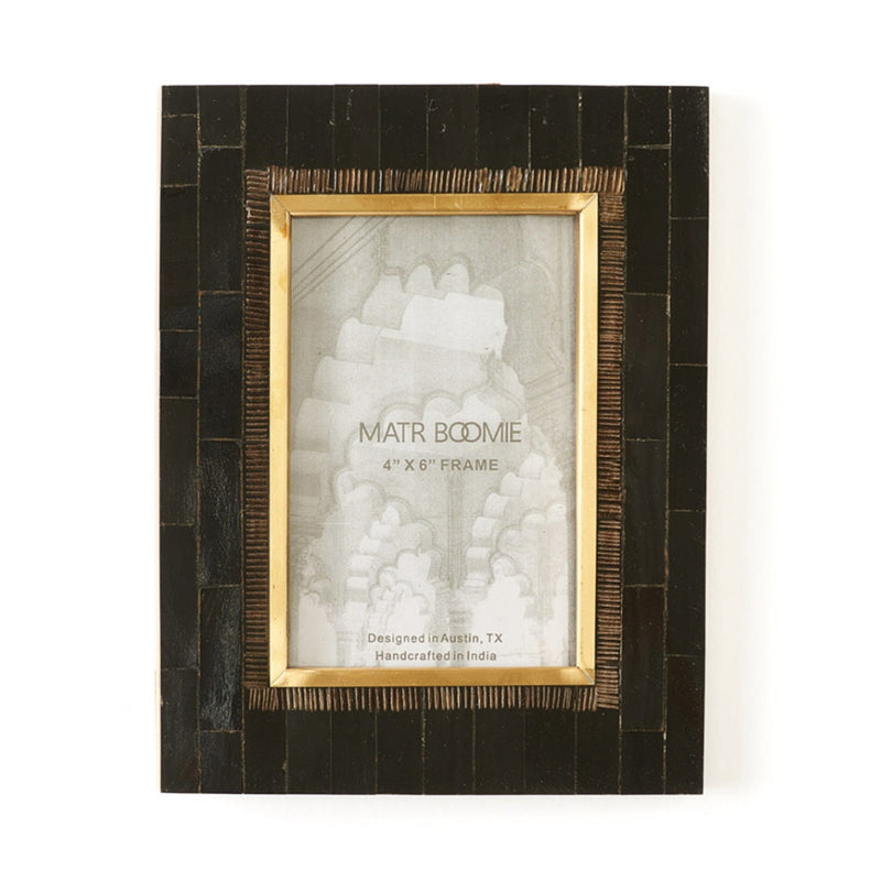 Black horn picture frame with brass inlay and gold-tone border