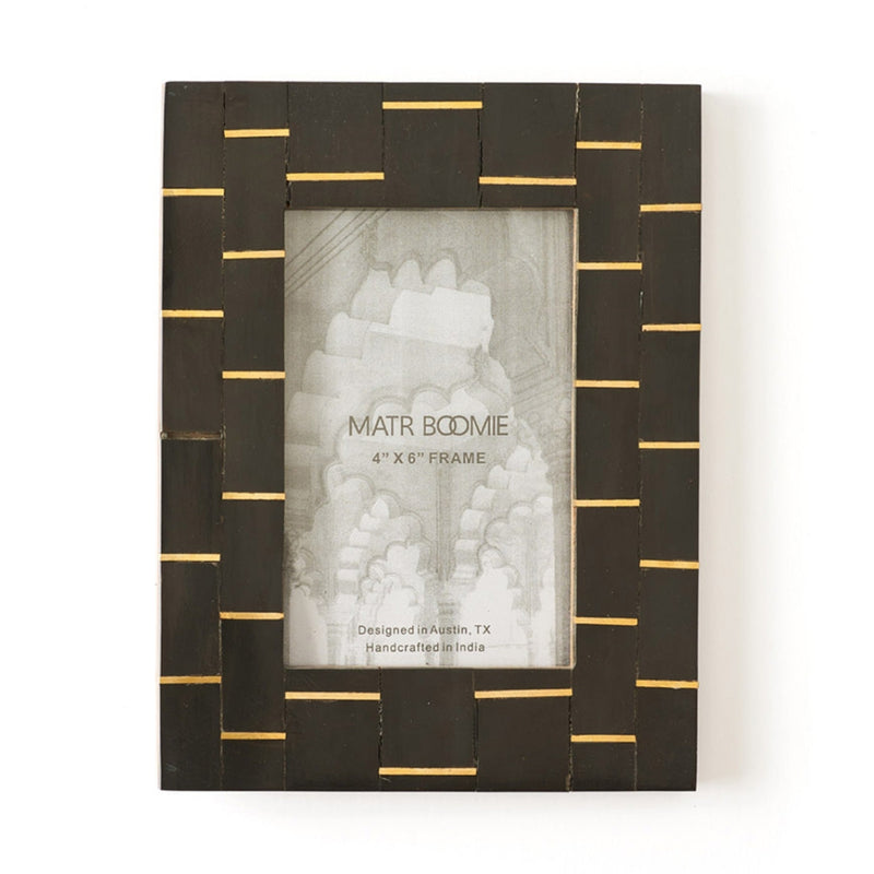 Black horn picture frame with gold brass dash accents