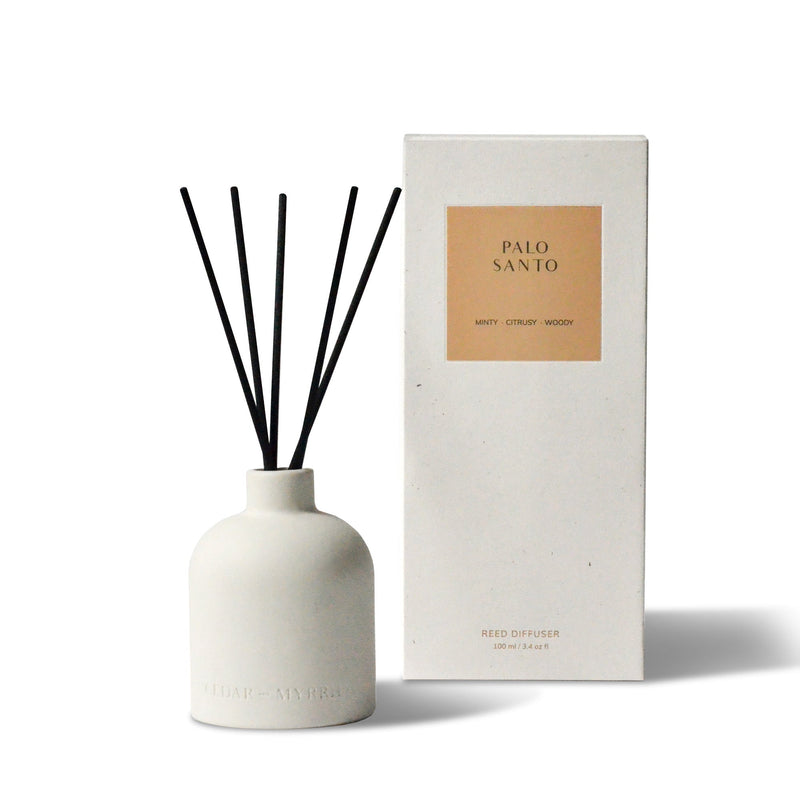 Palo Santo Reed Diffuser in ceramic bottle with reeds