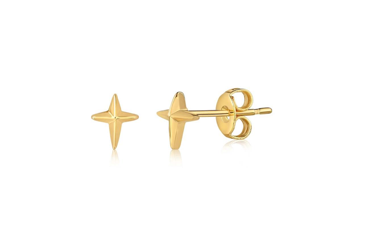 Shari Star Studs layered in ear stack with hoops