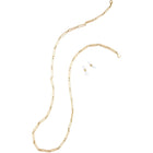 Gold sunglass chain attached to aviator sunglasses