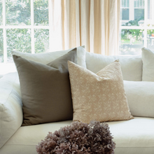 Fleur sand floral pillow in an organic modern living room