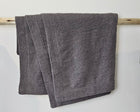 The Nest microfiber throw blanket in Charcoal