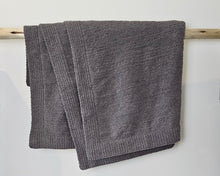The Nest microfiber throw blanket in Charcoal