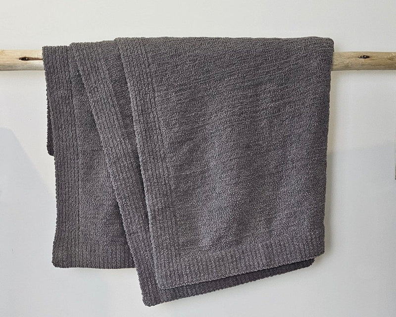 The Nest microfiber throw blanket in Charcoal