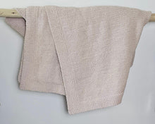 The Nest microfiber throw blanket in Fossil