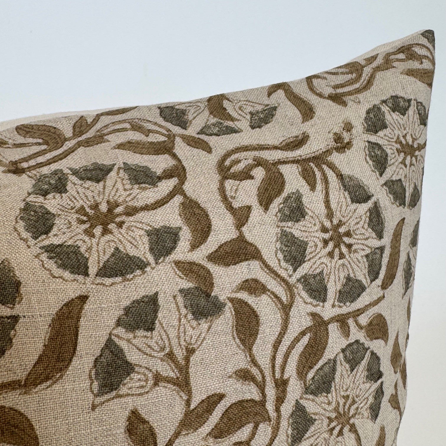 Close-up of floral linen pillow cover with invisible zipper