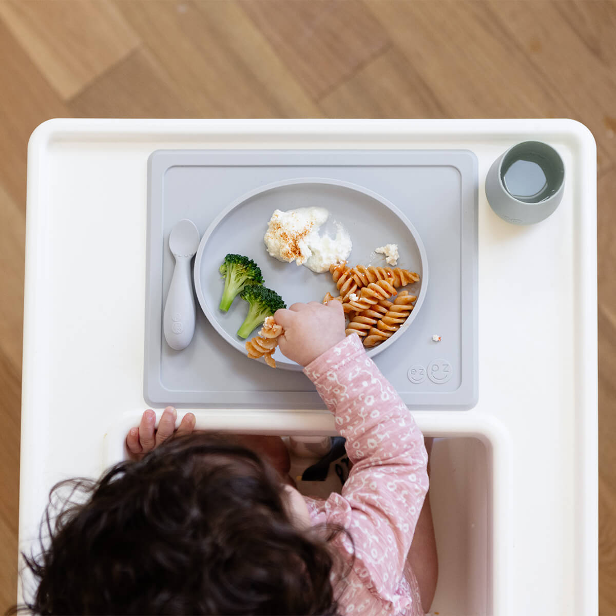 ezpz Tiny Plate on highchair tray during mealtime
