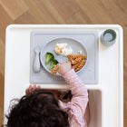 ezpz Tiny Plate on highchair tray during mealtime