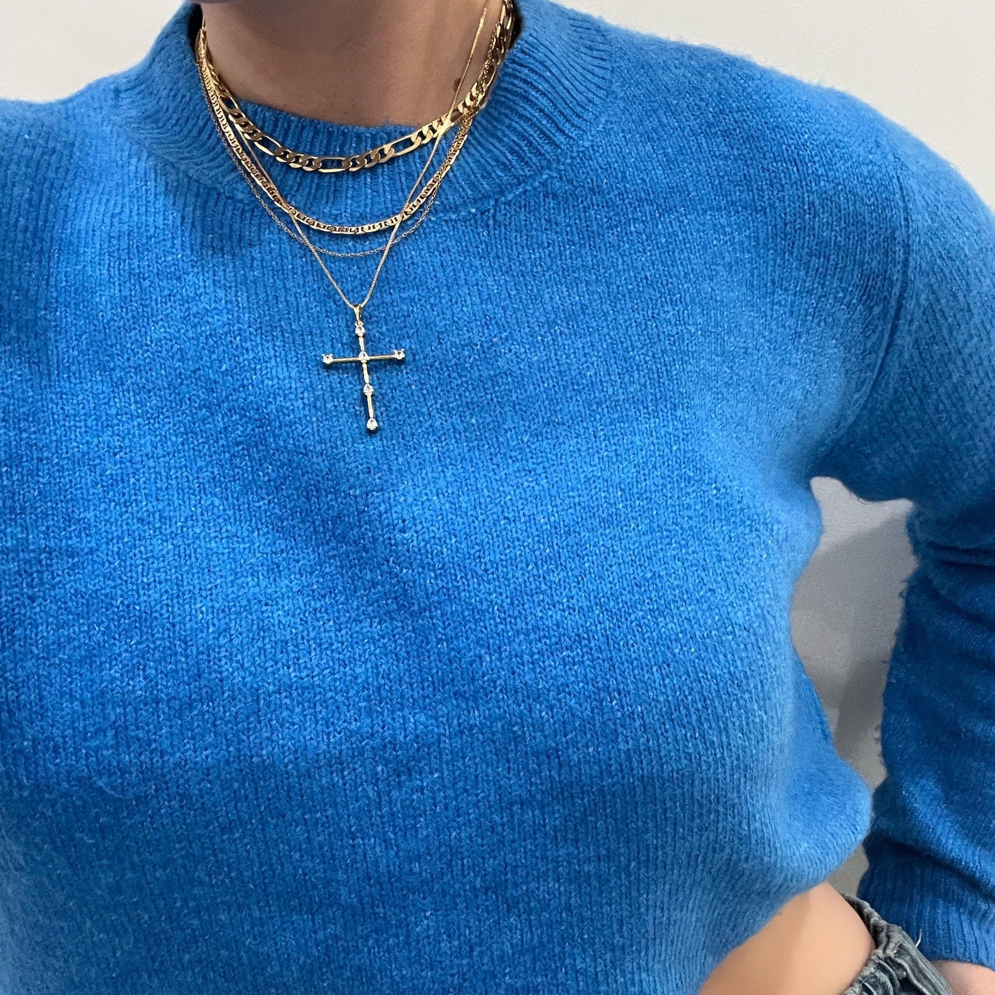 Layered cross necklace styling