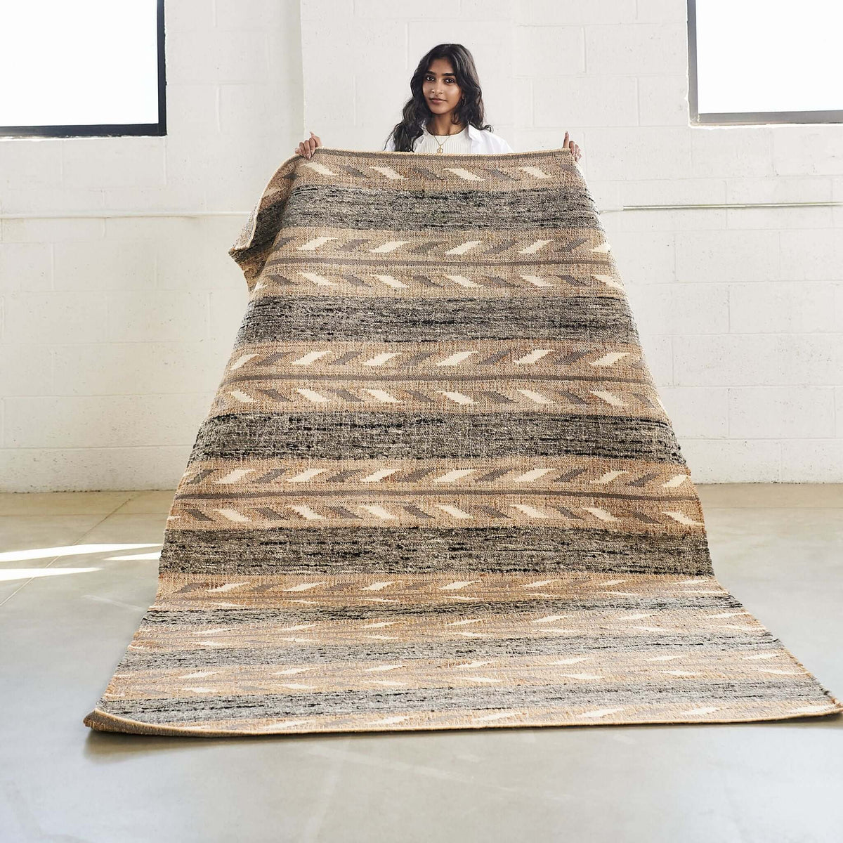 Uneven Arrows handwoven wool jute rug 5x8 in earthy hues – One Affirmation