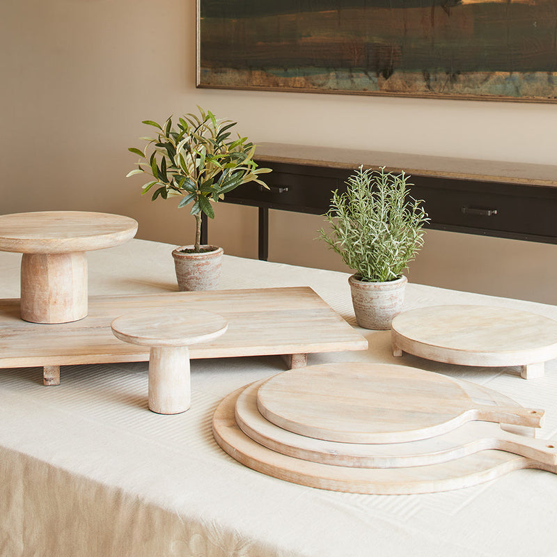 Handcrafted oblong mango wood serving board