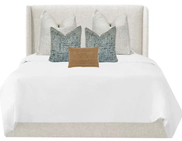 Santa Barbara Pillow Set resting on a bed