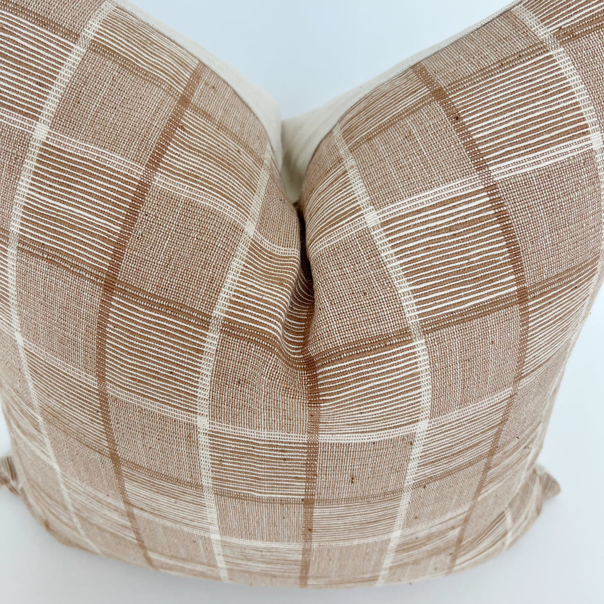 Rust and Cream Windowpane Pillow Cover over-head view