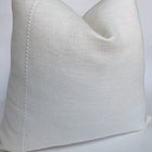 a side view of a white pillow
