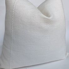 a side view of a white pillow