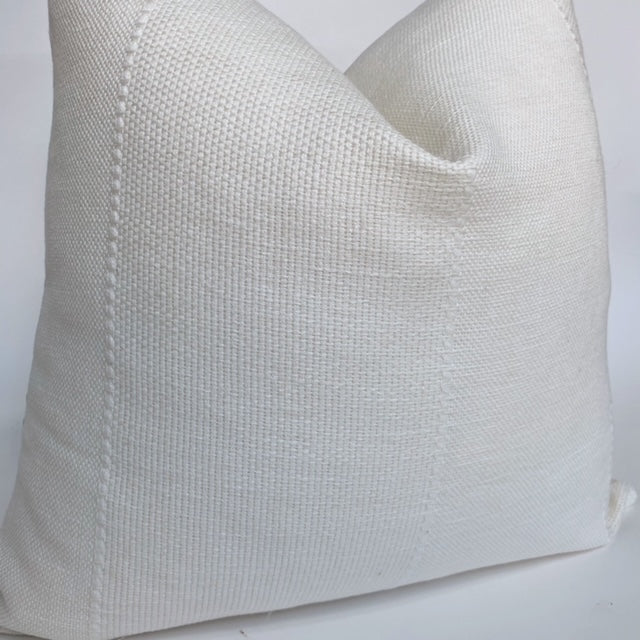 a side view of a white pillow