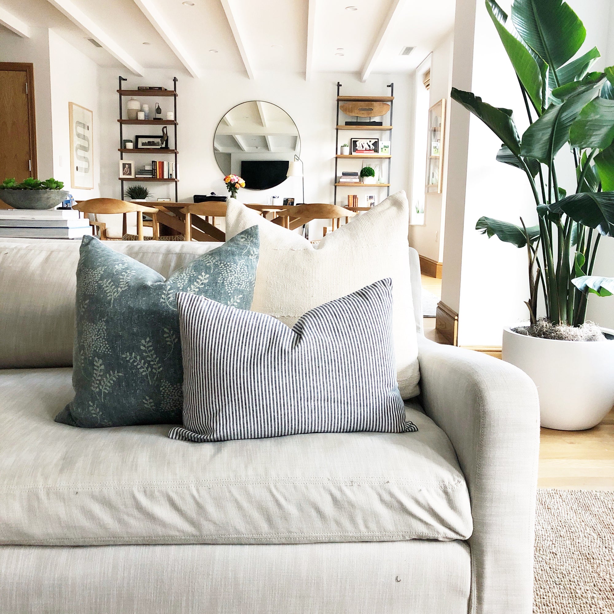 Modern Rustic living room with grey couch and throw pillows
