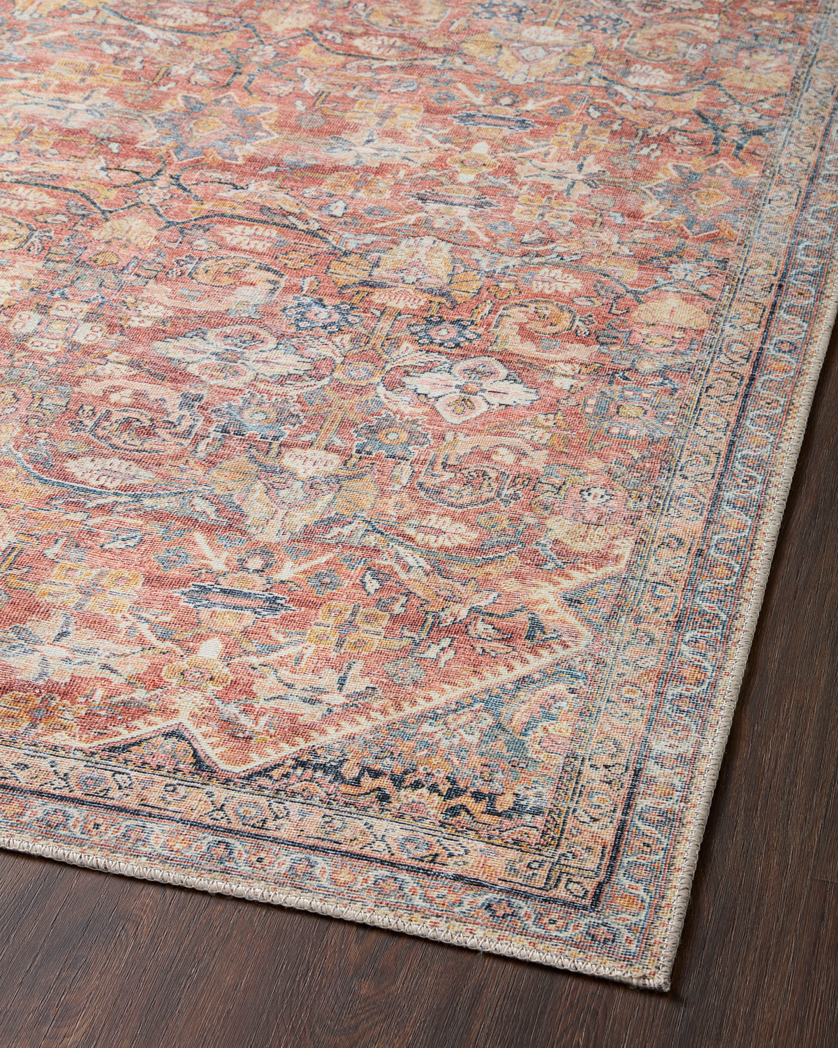 Cara Blue/Rust Rug corner