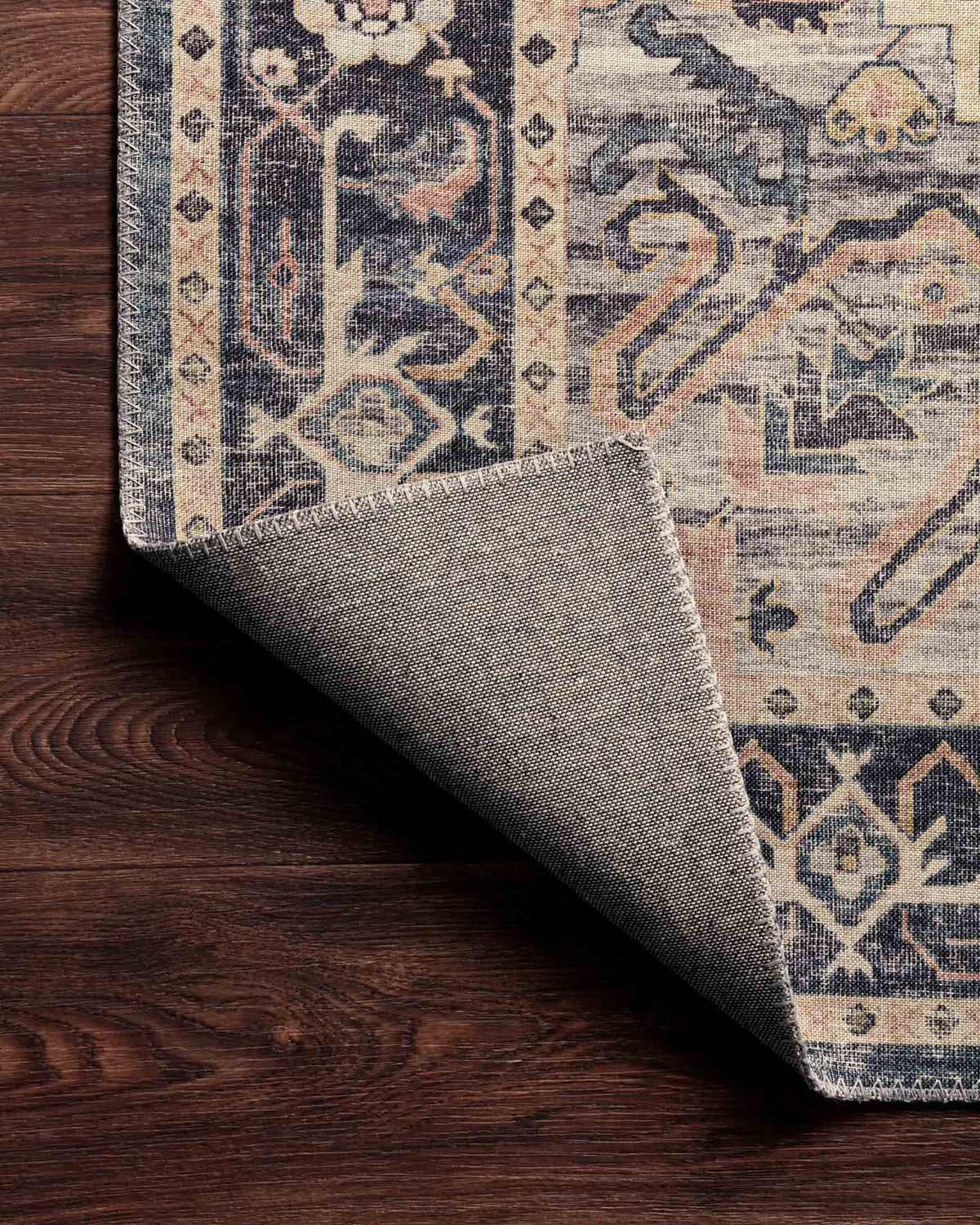 Anne Rose/Azul rug with the corner folded