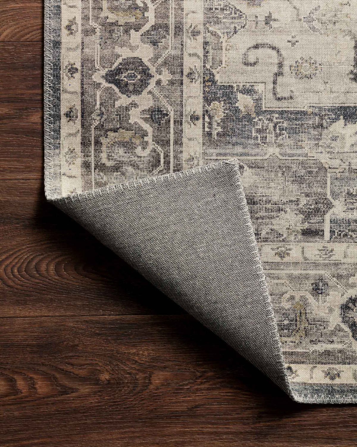 Anne Coal/Cream rug corner folded