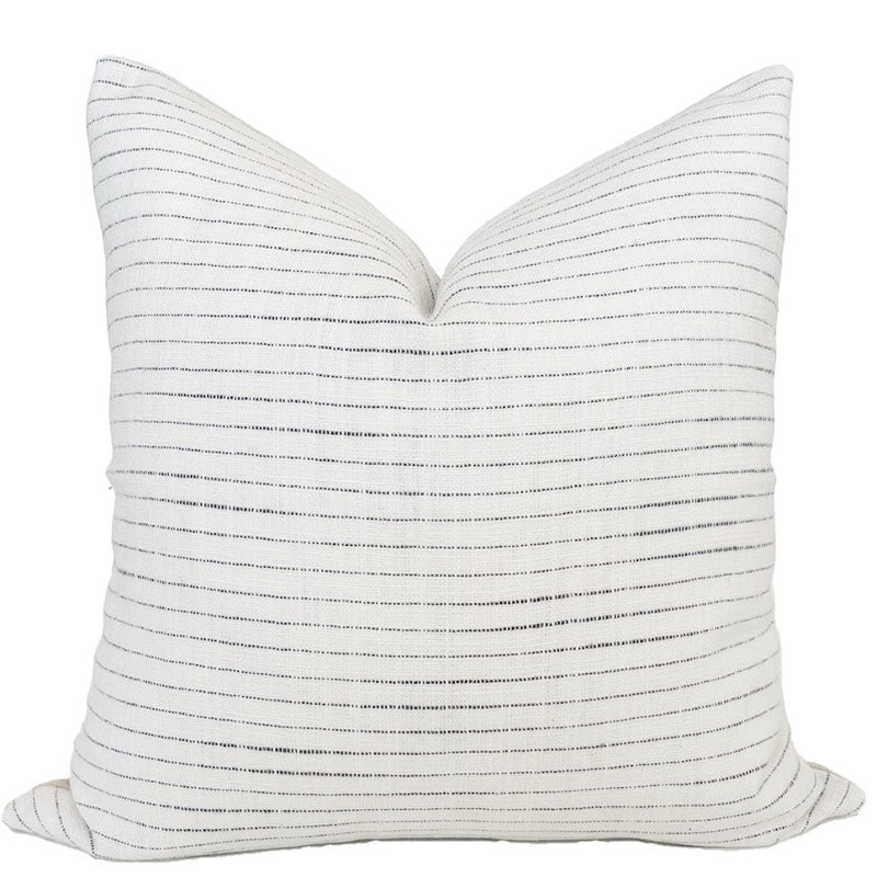 White coastal pillow cover with thin woven blue stripes. 