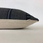 side view of the navy florence pillow cover