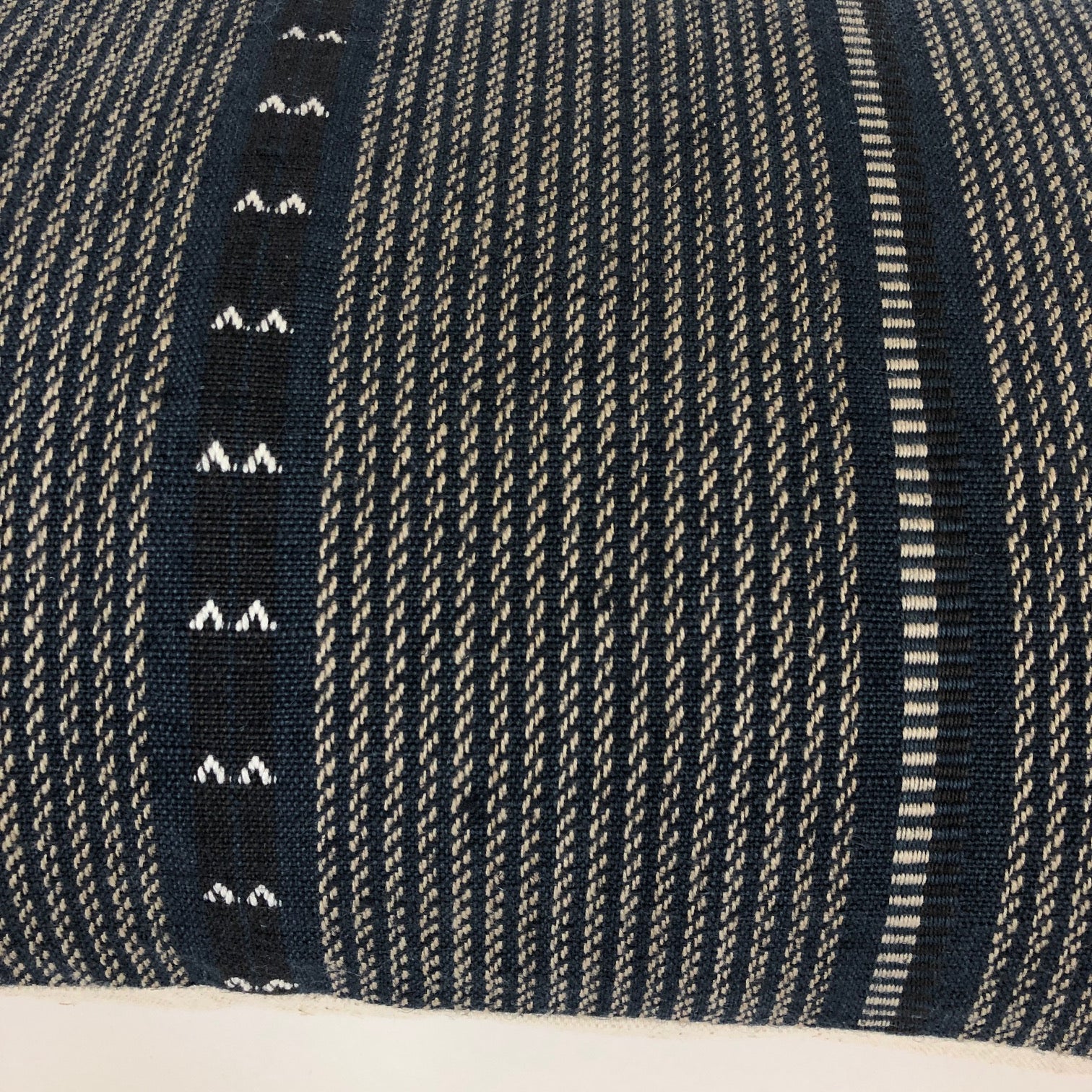 close-up view of the navy florence pillow cover