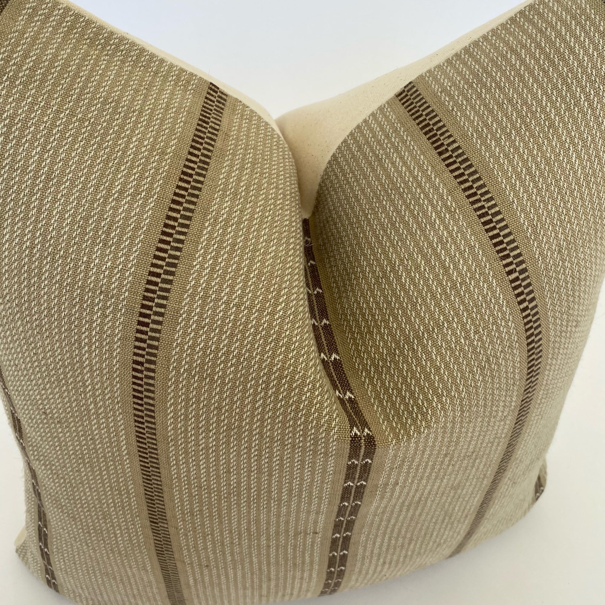 a close up to the brown pillow