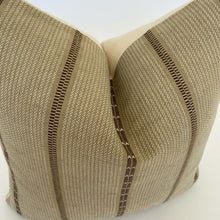 a close up to the brown pillow