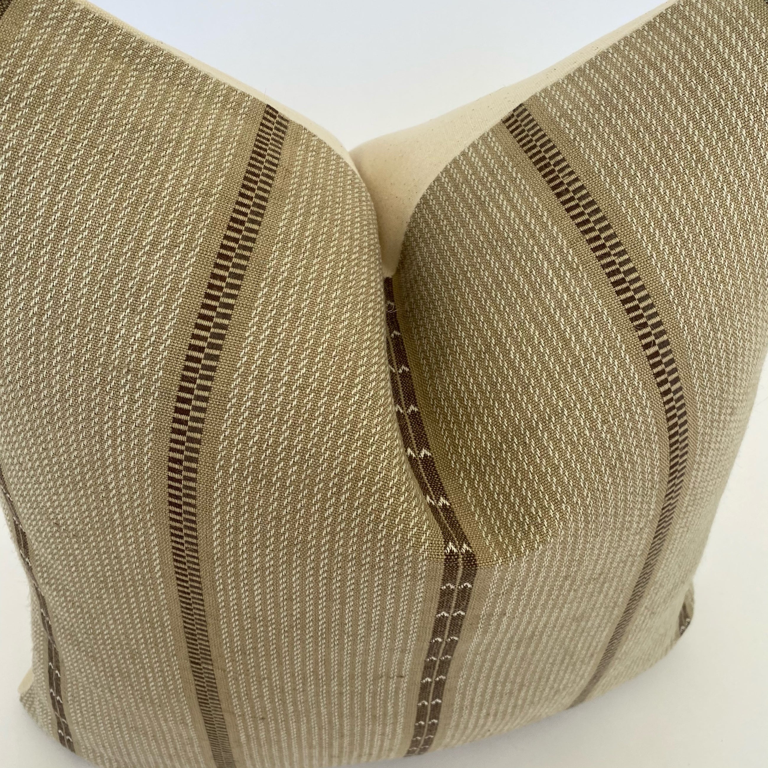 a close up to the brown pillow